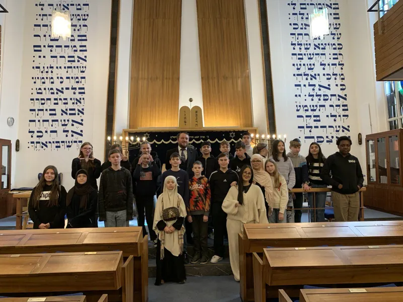 A school class visiting a synagogue